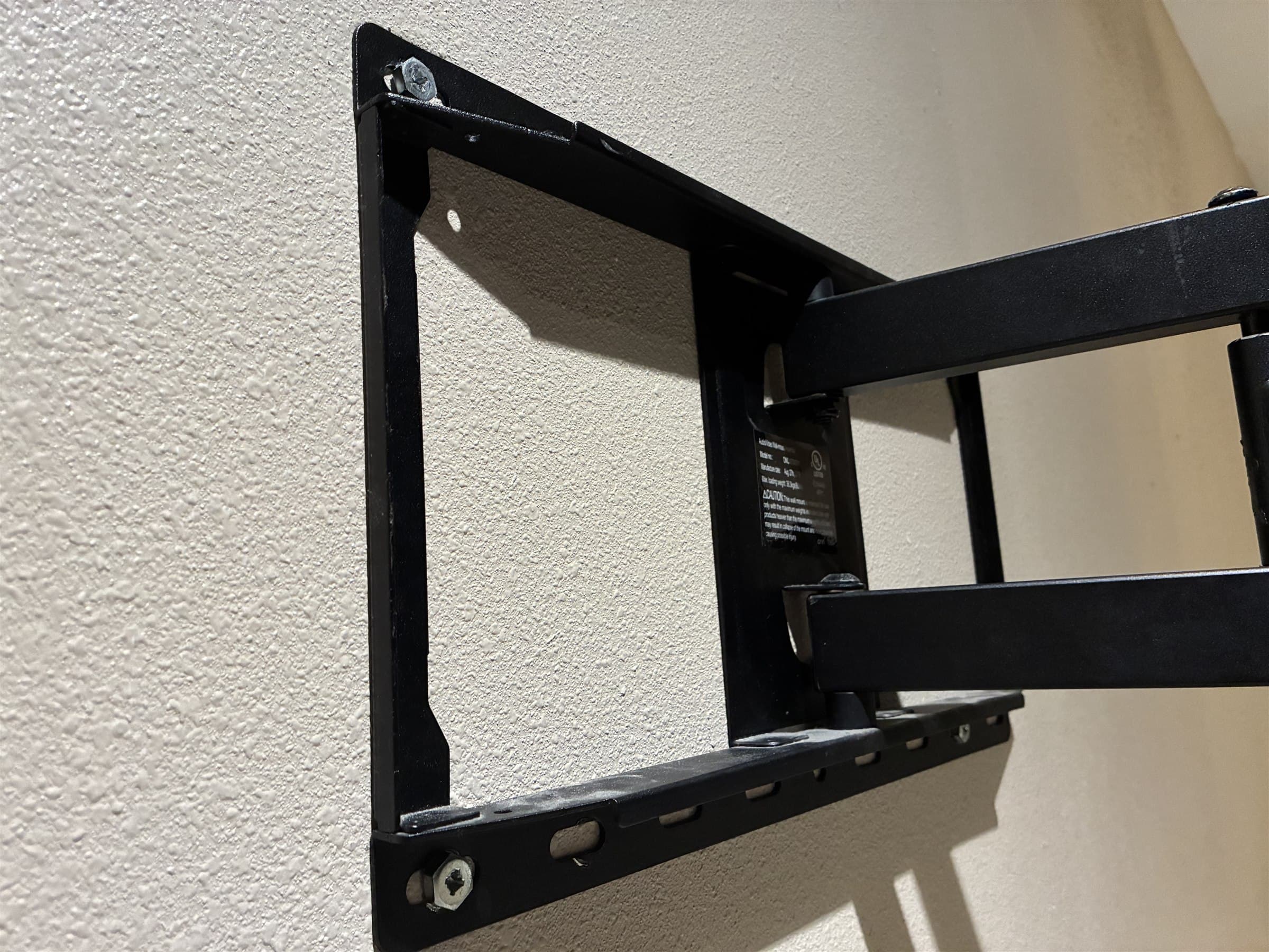 Angled view of completed TV mounting project